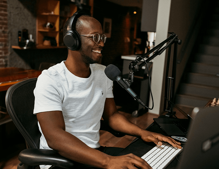 Person recording podcast